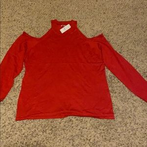 New York & Co. red peak-a-boo shoulder top.